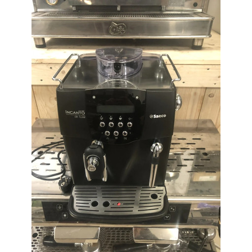 Automatic coffee maker Saeco Incanto De Luxe Black with automatic cleaning function — used